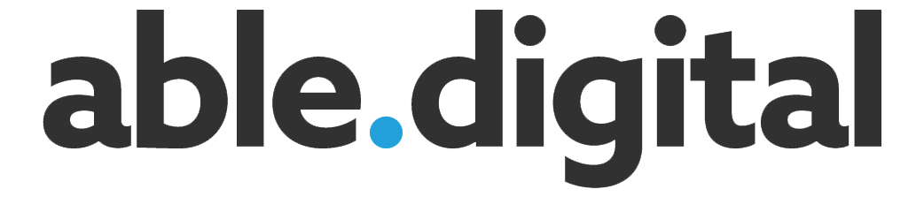 Able.Digital horizontal wordmark in charcoal with blue dot